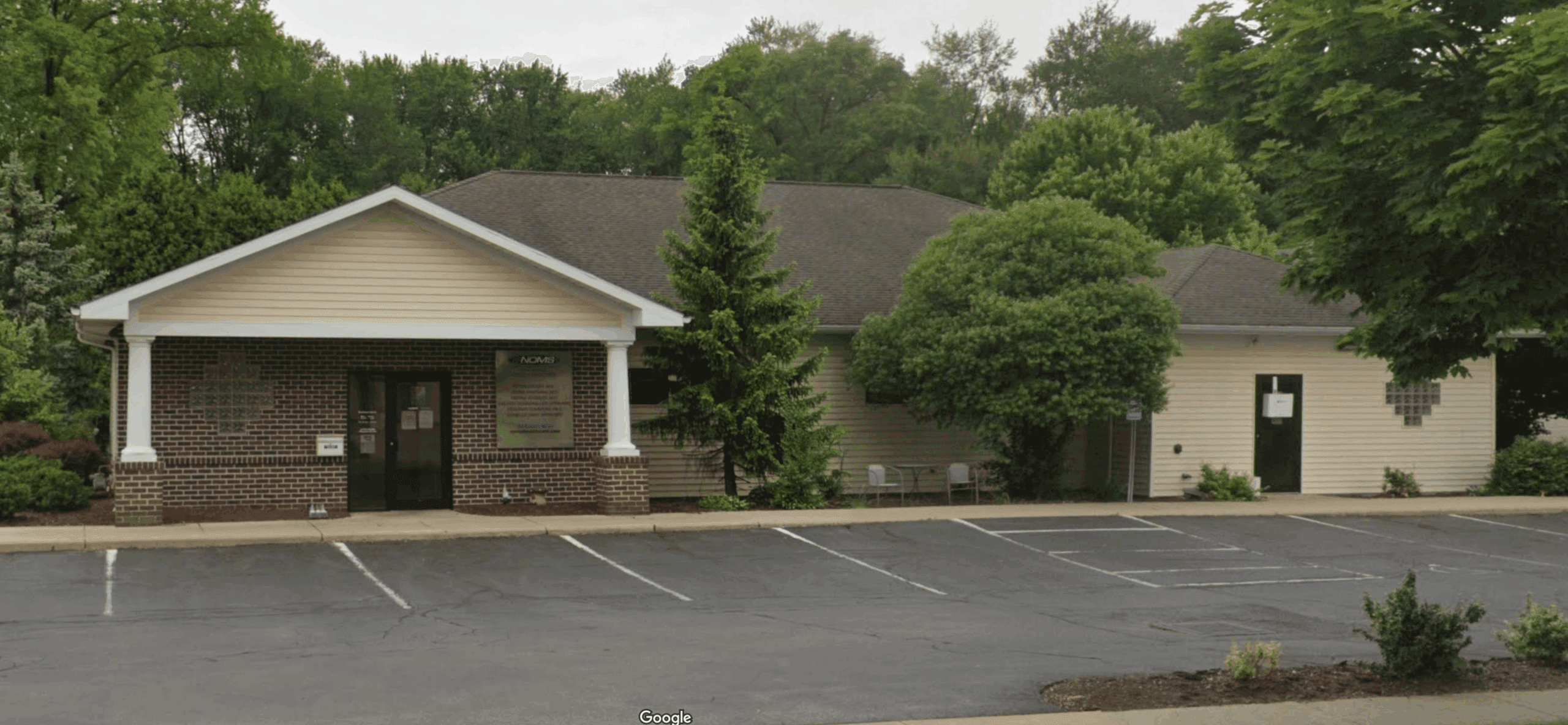 Exterior photography of the NOMS Norwalk Family Practice building.