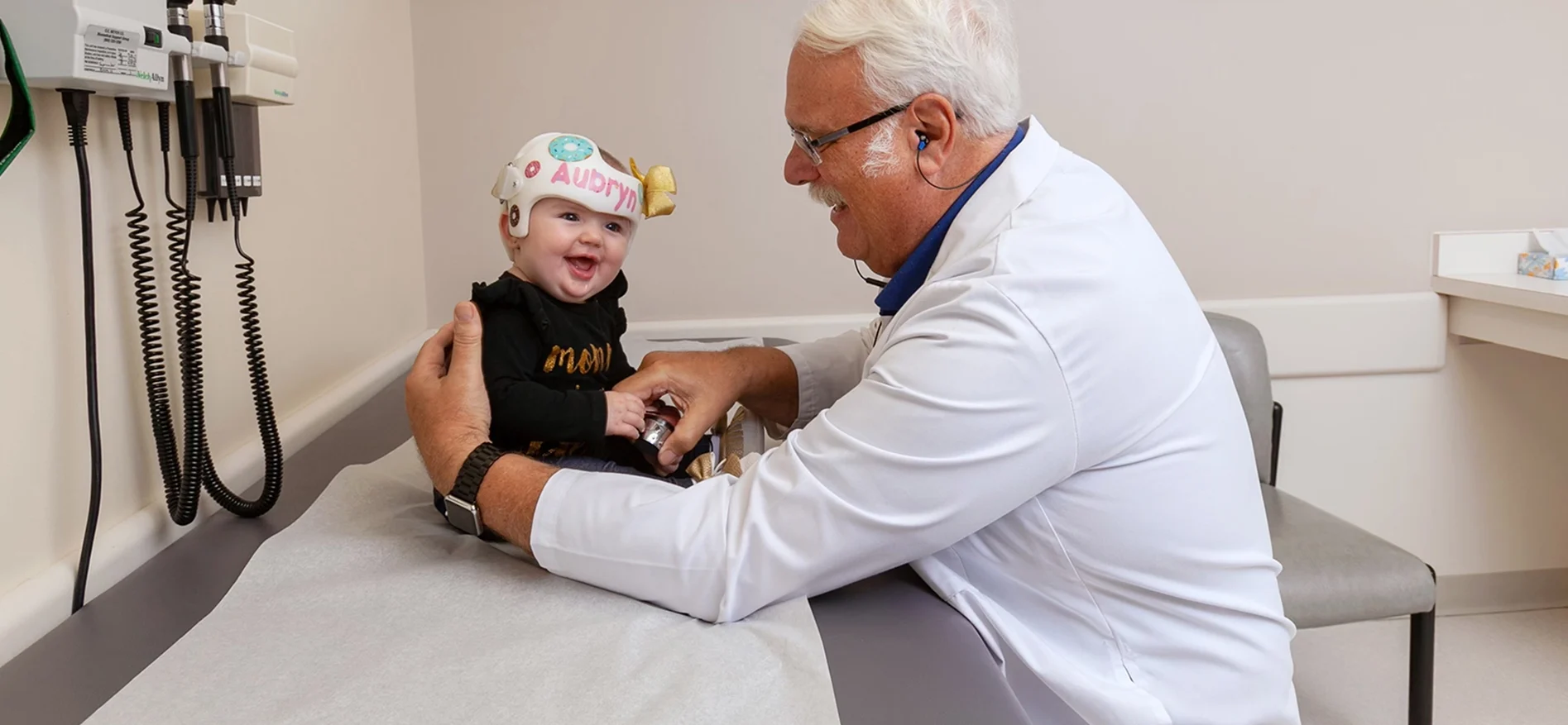pediatric doctor sharing a candid moment with a happy child