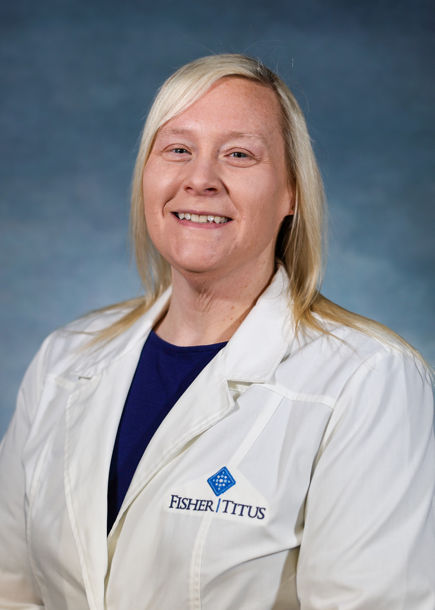 Rebecca Dendinger in a White Coat